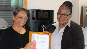 Sam Mzobe receives CAPRISA Recognition Award